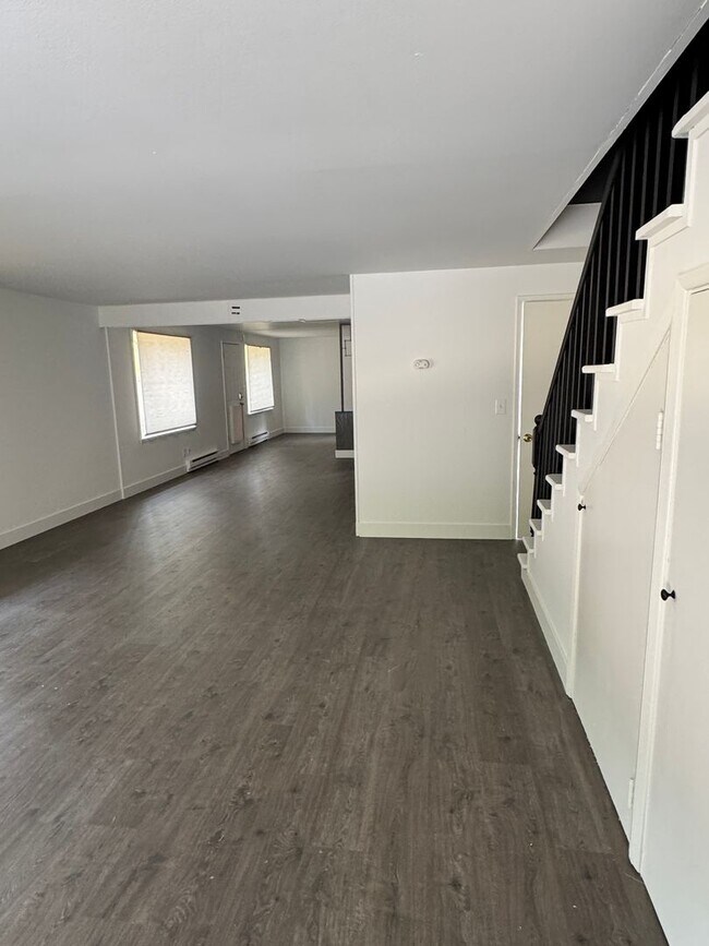 Building Photo - Spacious Two Story (2BR/1BA) Home with Large Fenced-In Yard