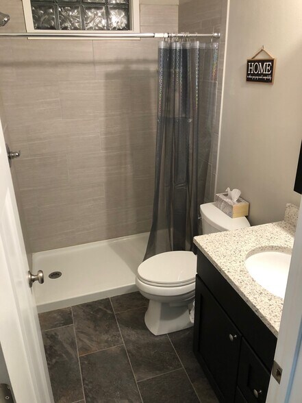Lower Level Bathroom w/ Shower - 825 N Dodge St