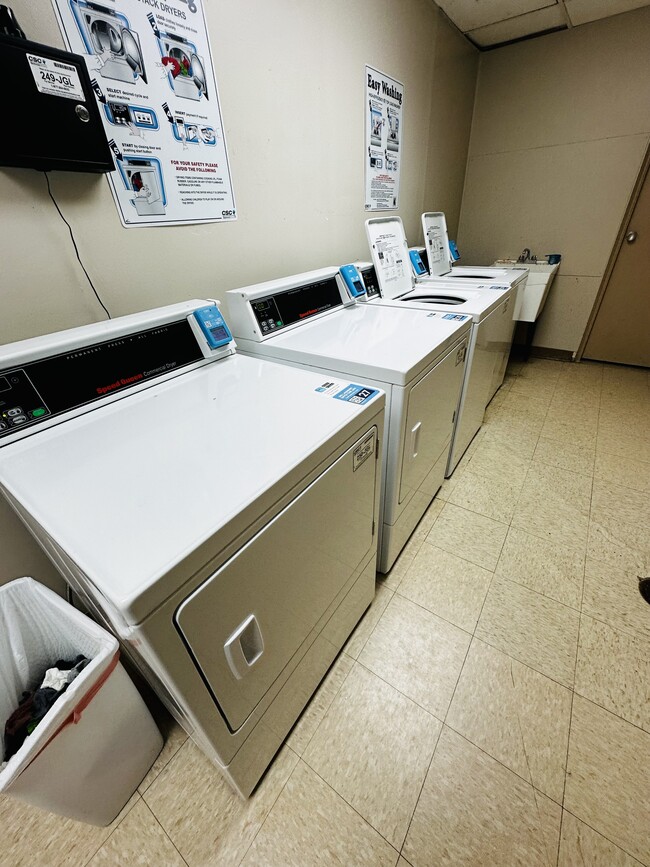 Shared laundry in building - 601 College Park Dr