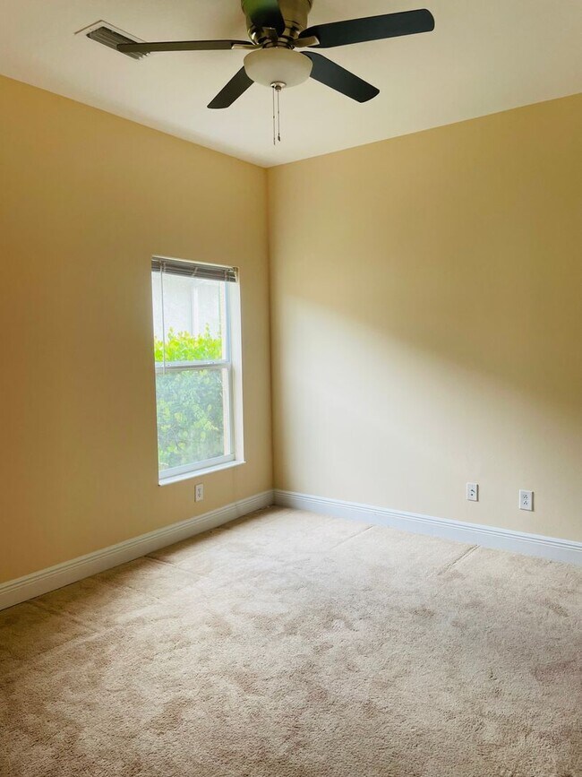 Building Photo - **SUNCOAST LAKES GATED COMMUNITY**