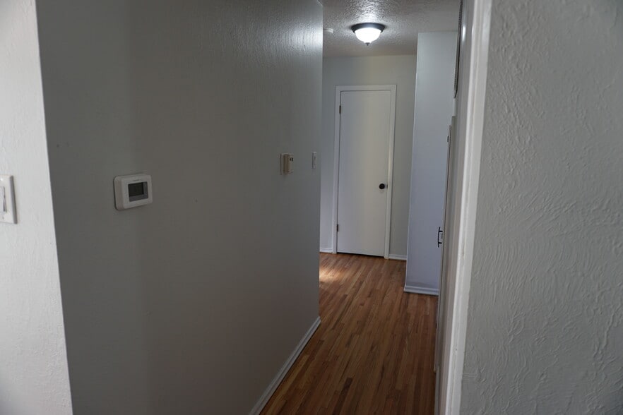 Hallway with heating and cooling controls - 10108 Chapala Ct NE
