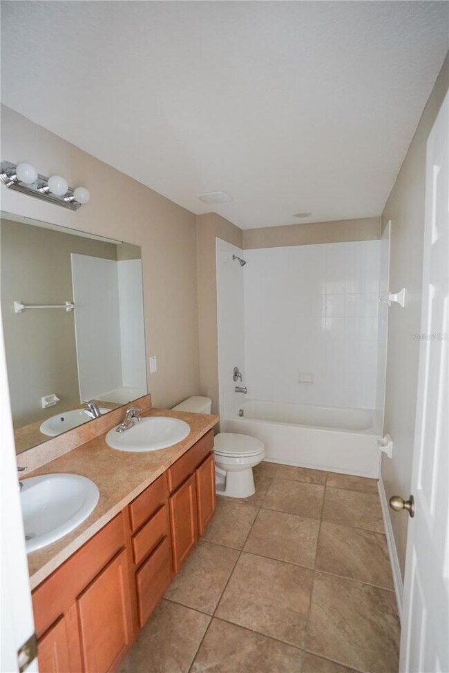 Building Photo - Beautiful 4BR/3.5BA Home with Dual Primary Suites in Harmony for Rent!