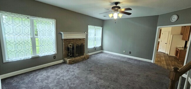 Building Photo - Commanding Curb Appeal, Conveniently Place