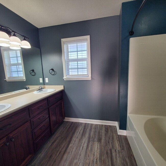 Building Photo - Tranquil Oasis: Spacious 4BR Home with Mod...