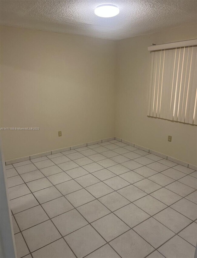 Building Photo - 8990 SW 24th St