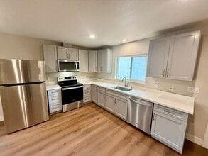 Building Photo - NEW BUILD! Beautifully designed mini home with Solar!!