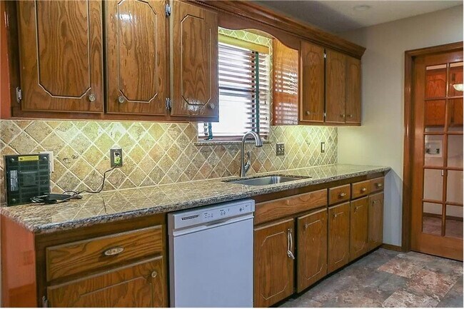 Building Photo - Updated Gem with Shop & Storm Shelter