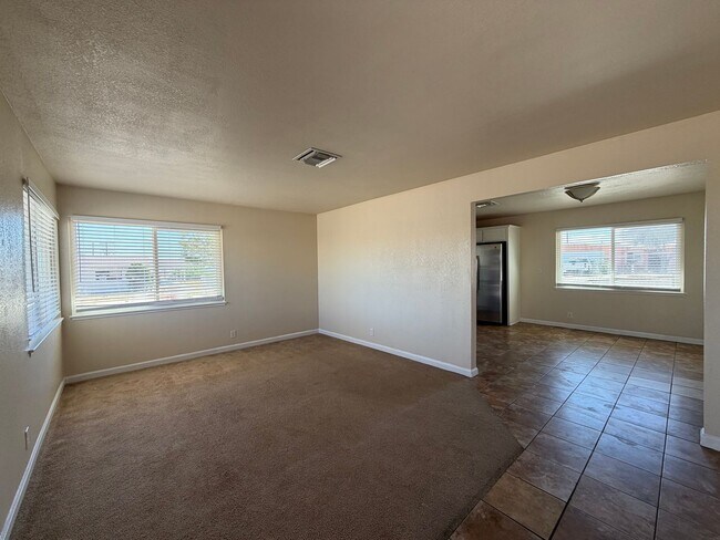 Building Photo - 3 Bedroom 2 Bathroom House with Central A/C , 2 Car Garage and Beautiful Backyard with Covered Patio