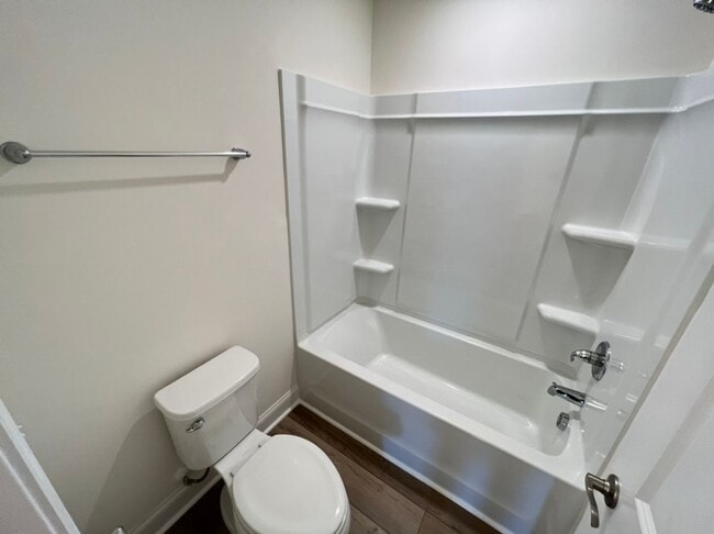 Building Photo - LIKE NEW 4 Bedroom Home w/ Ground Floor Be...