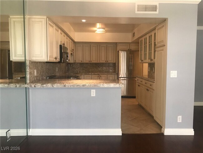 Building Photo - 205 E Harmon Ave