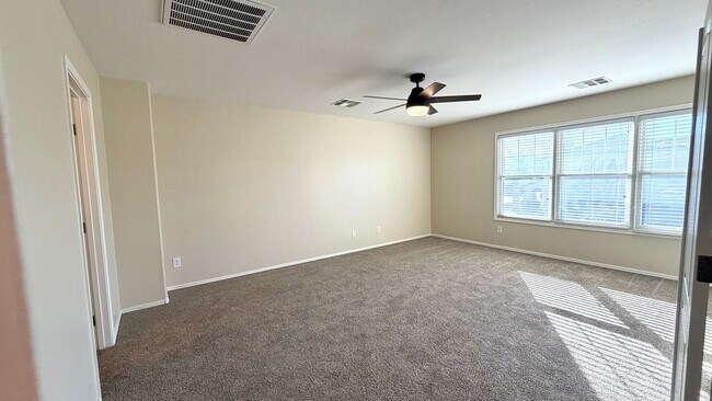 Building Photo - Spacious Surprise home with large backyard