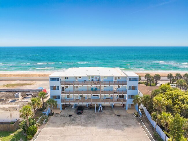Building Photo - Luxury Oceanfront Living – Fully Furnished...