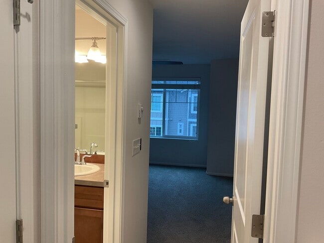 Building Photo - Riverfront Townhome with Tandem Garage & Fenced Yard