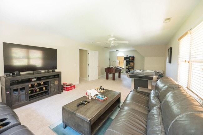 Building Photo - Spacious & Striking 3-story brick Executive 4 bedroom 4.5 bathroom home in Oak Ridge NC + Lawn ca...