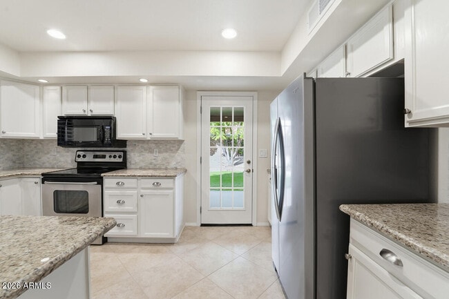 Building Photo - 5720 E Le Marche Ave