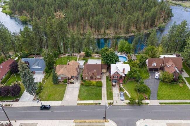 Building Photo - **COMING SOON** Beautiful Down River Brick Bungalow with River Views