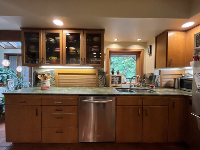 Building Photo - One-of-a-Kind Custom Home with Wall of Windows, Stone Fireplaces, Expansive Entertainment Space &...