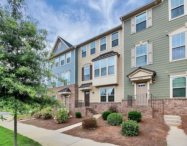 Building Photo - Stunning 3 Story 3BD/2+2HalfBA Townhome in...