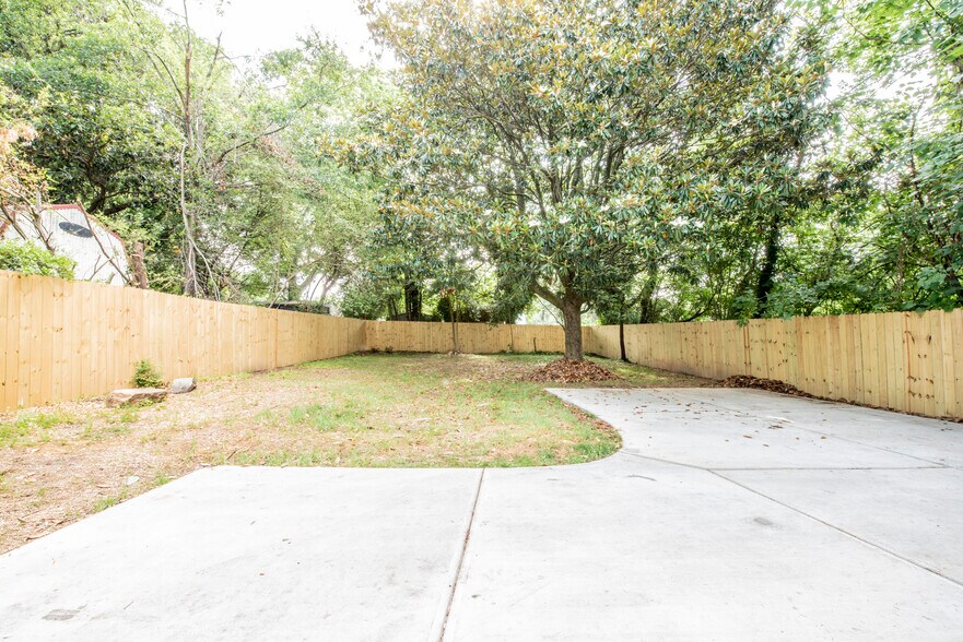 back yard now has two separate fenced areas - one for each unit - 919 S State St
