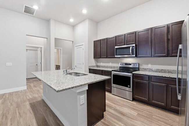 Building Photo - $1,640.95, 2-bed, 2-bath condo located in Aurora.