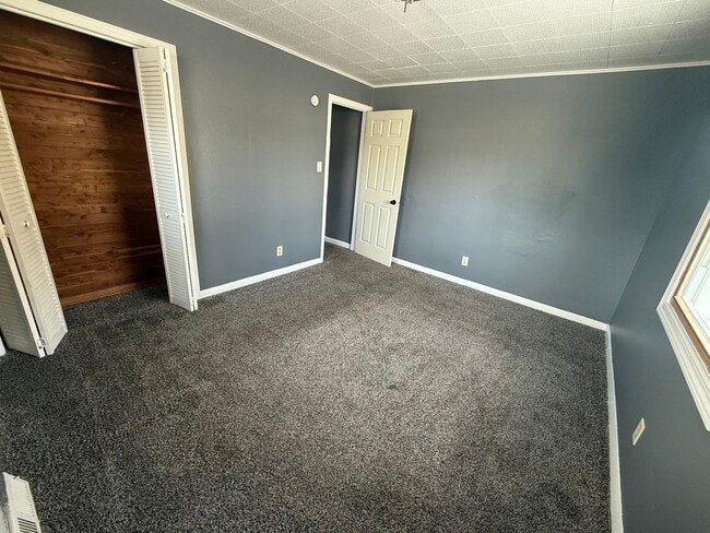 Building Photo - Check Out this Renovated House in a Quiet Neighborhood with a Large Yard!