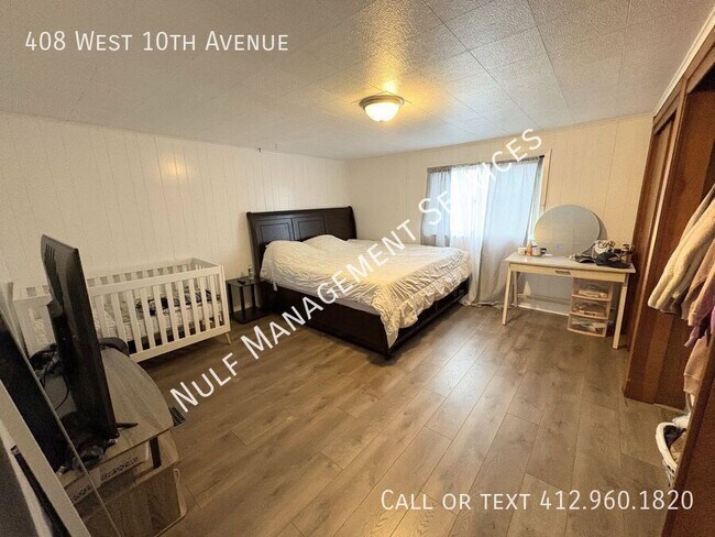 Building Photo - 408 W 10th Ave