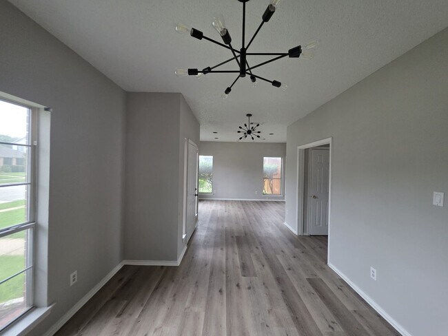 Building Photo - Spacious 4-Bedroom Home with Pool & Spa in...