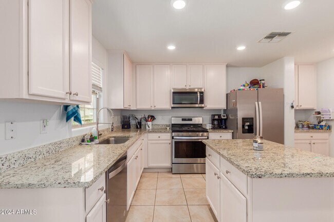 Building Photo - 8216 W Albeniz Pl