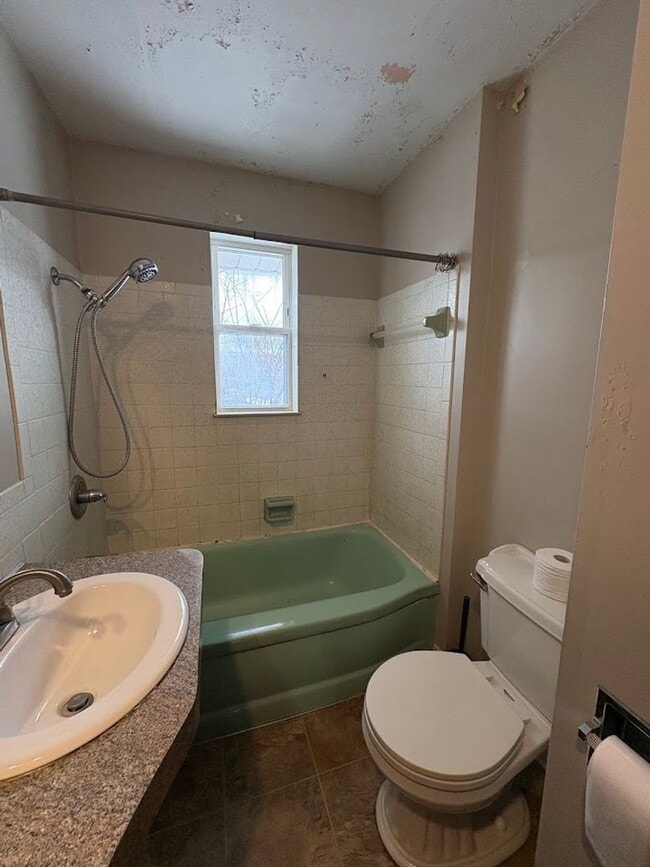 Building Photo - Three bedroom two bathroom single story home for rent