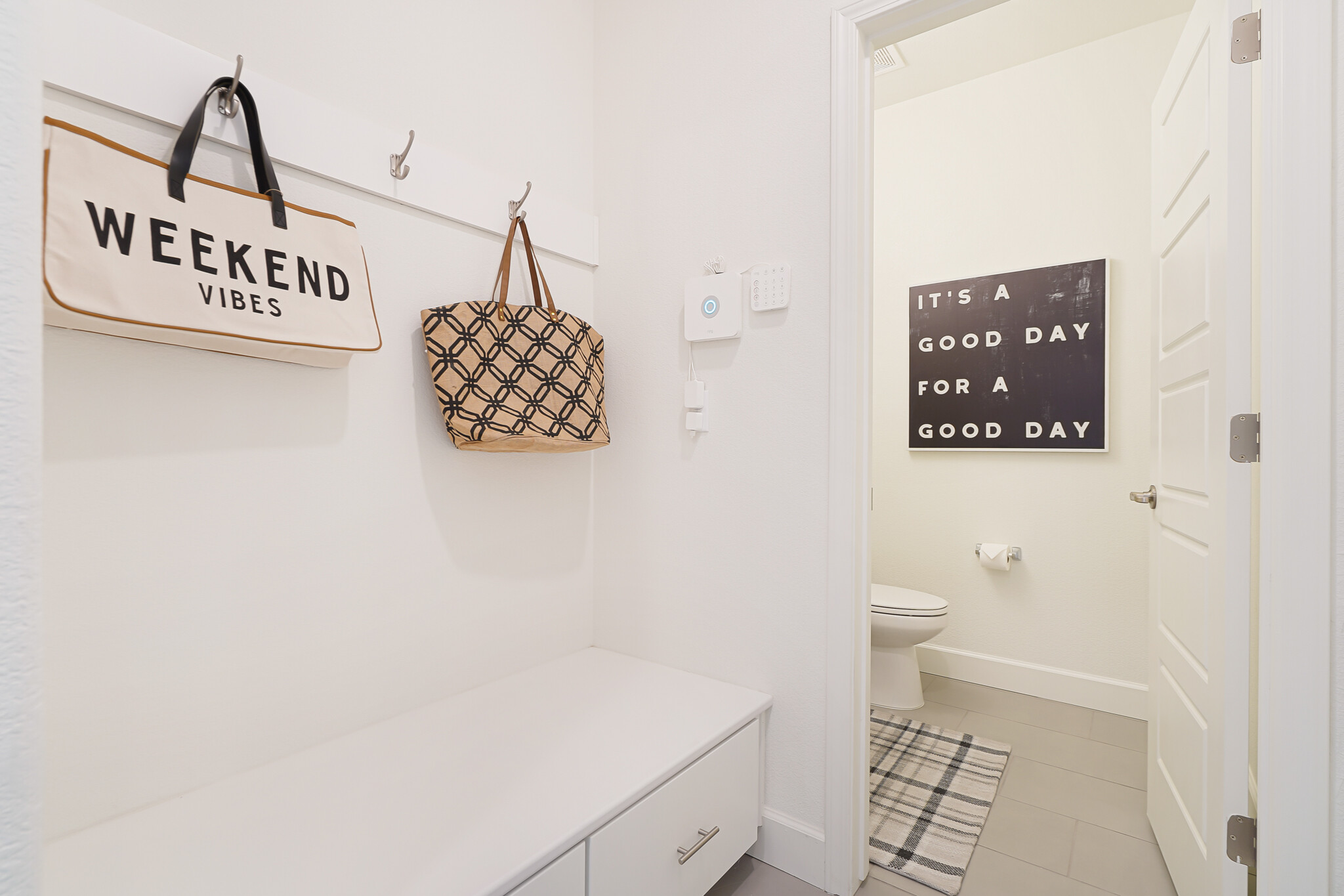 Mud room when walking in from garage. - 5919 Lakestone Dr