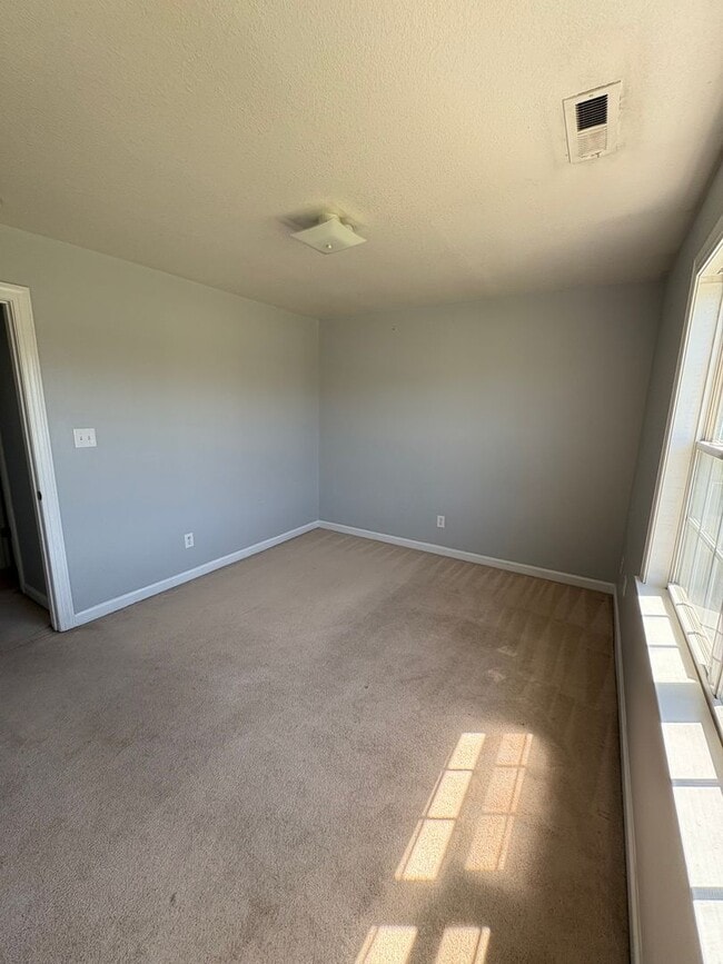 Building Photo - Charming two bedroom one and a half bath town home that is centrally located. Just a short drive ...