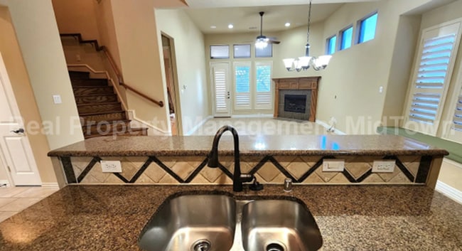 Building Photo - Well-Planned 4BR/3BA—Space for Guests, Off...
