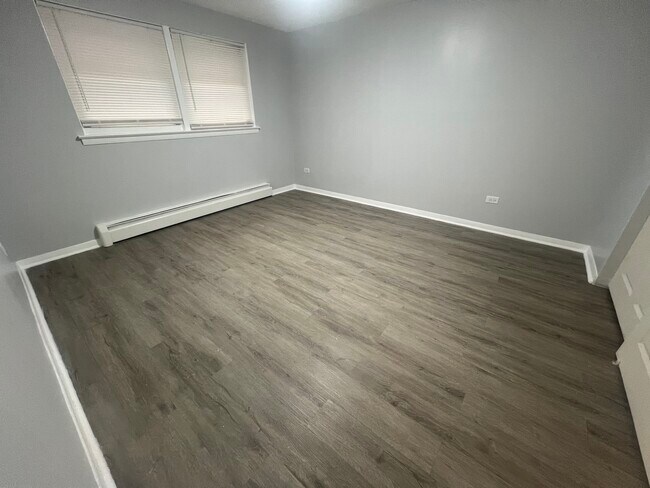 Building Photo - 6412 S Evans Ave