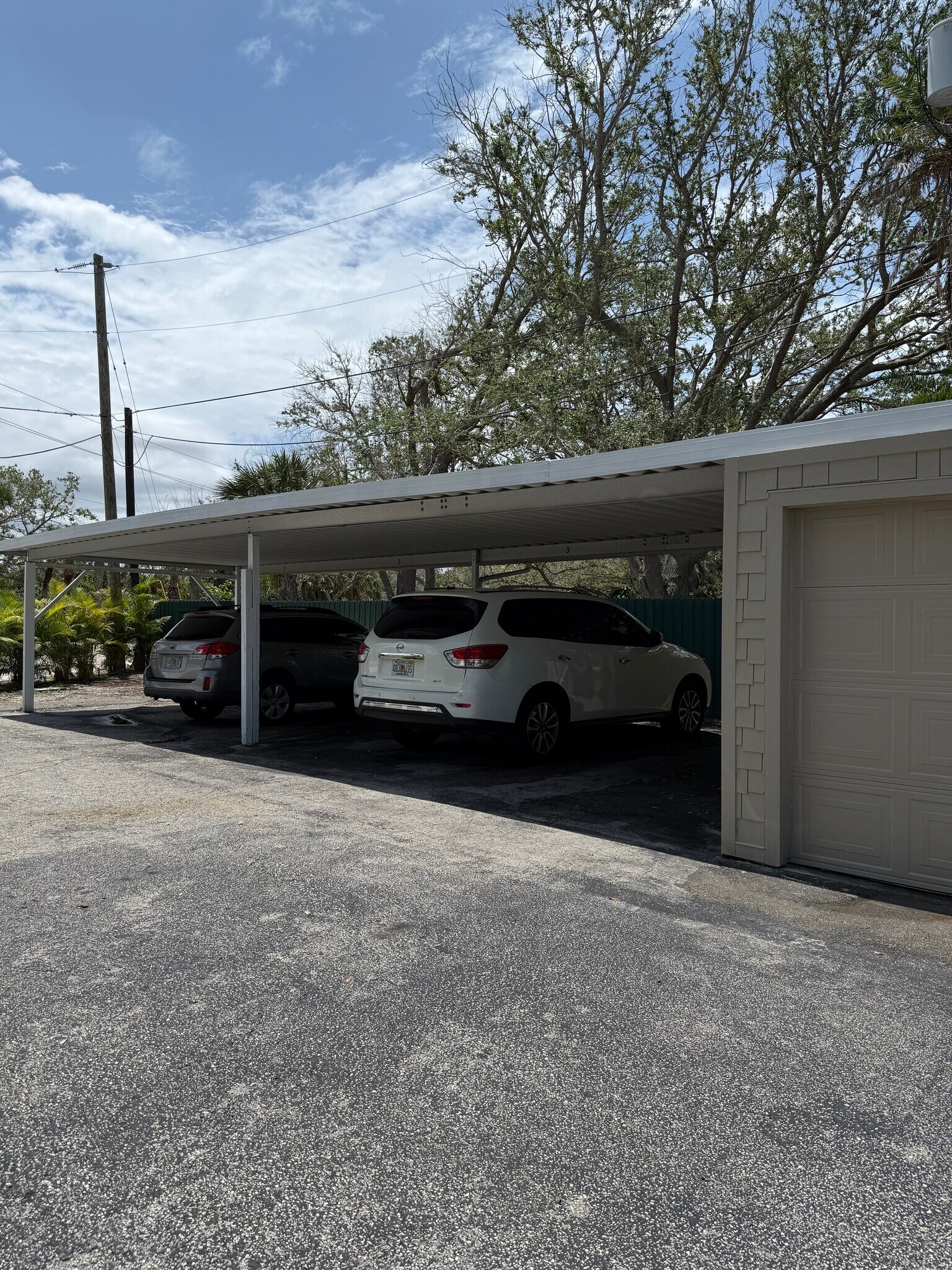 Covered parking area. - 7006 Midnight Pass Rd