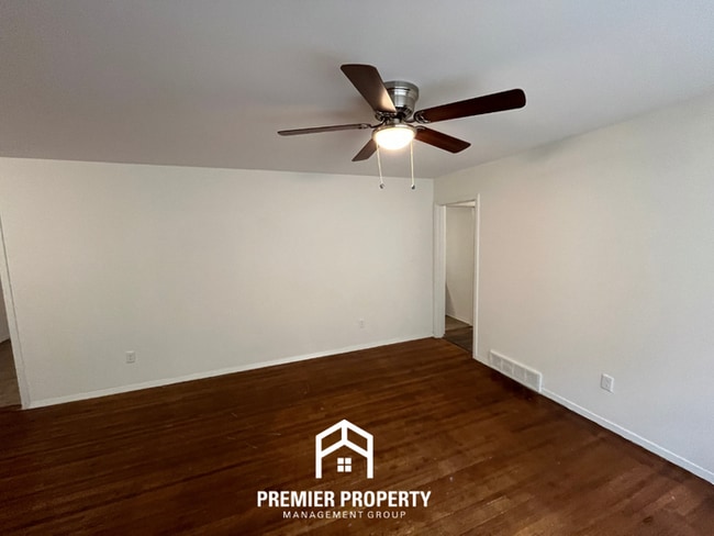 Building Photo - Spacious 3BR/2BA Home with Den & Living Room | Brick Fireplace & Large Yard