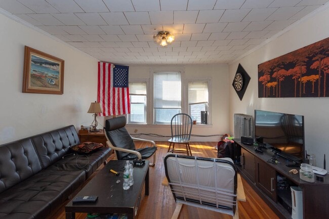 Building Photo - No Brokers Fee, Heat and Hot Water Included, Top Floor Unit, Steps from the T Stop, Eat-in Kitche...