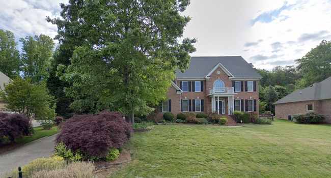 Building Photo - Spacious & Striking 3-story brick Executiv...
