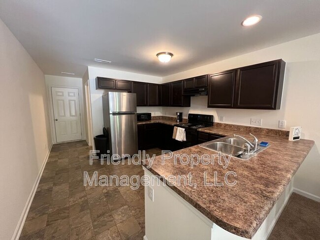 Building Photo - 1202 W Meadowview Rd