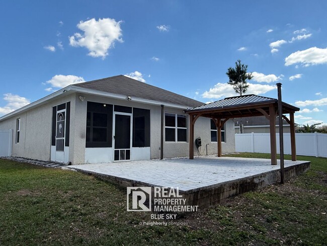 Building Photo - Stunning 3/2 Home with Premium Upgrades