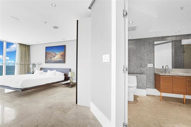 Building Photo - 16699 Collins Ave