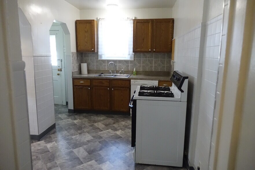 New floor in kitchen - 908 Thomas Rd