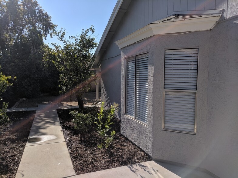 Facing east on north side of back yard - 14101 N 78th Dr