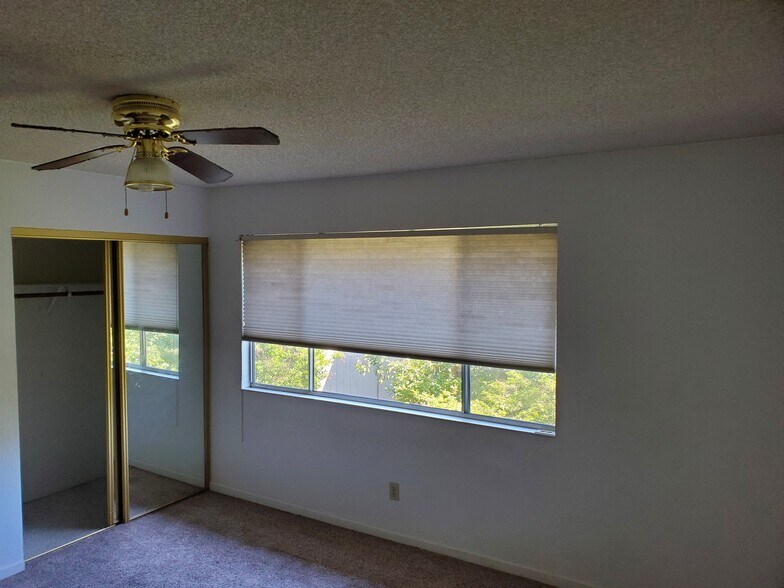 Larger bedroom upstairs with 2 closets. - 1710 Oldfield Way