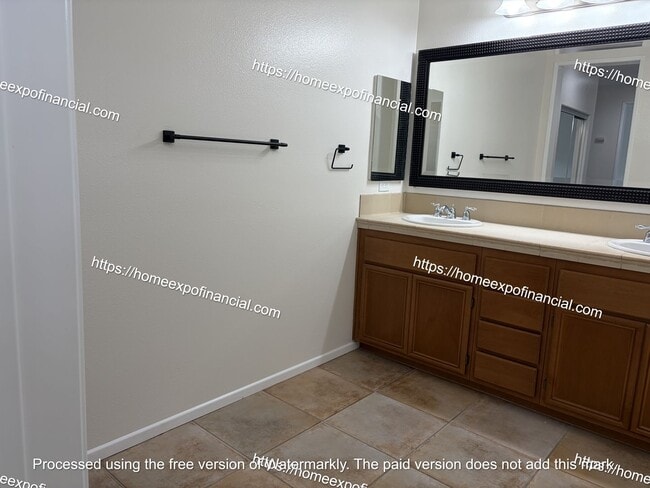 Building Photo - 8157 Garden Gate St