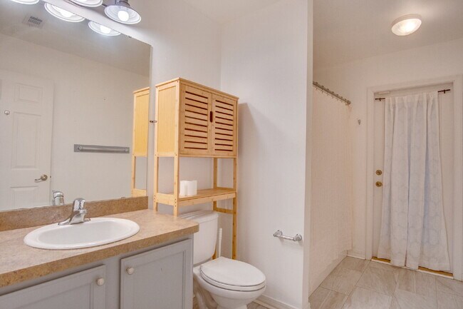 Building Photo - Energy-Efficient 3BR/2BA Solar Home in Pace with Screened Porch, Fenced Backyard, Updated Kitchen...