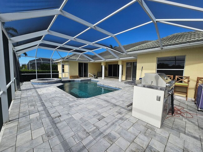 Building Photo - Waterfront Pool Home AVAILABLE NOW!