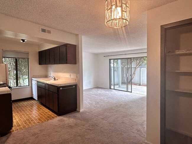 Living room with access to large patio - 1925 46th Ave
