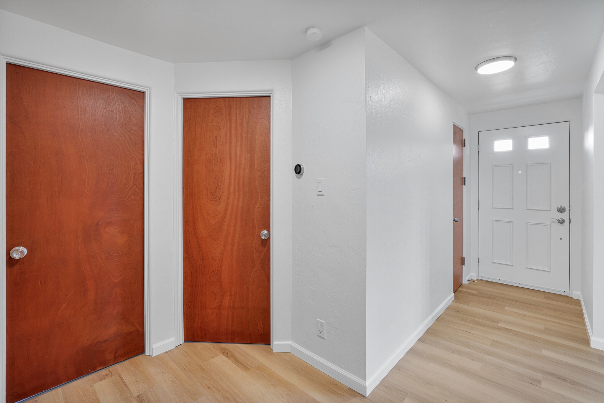 Upstairs Hallway and Bedroom doors with a closet - 1755 Elderslee Rd