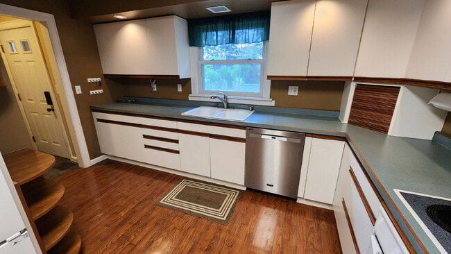 Building Photo - Spacious 4-Bedroom Home with Bonus Room, 3-Season Porch & Private Backyard