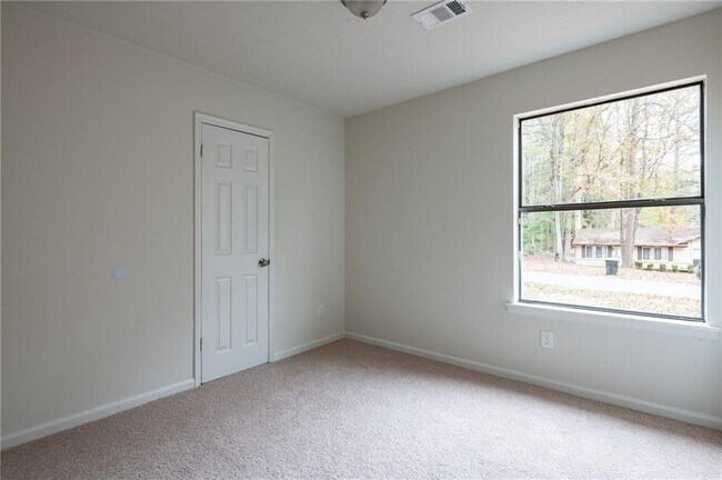 Building Photo - 9250 Woodgreen Way